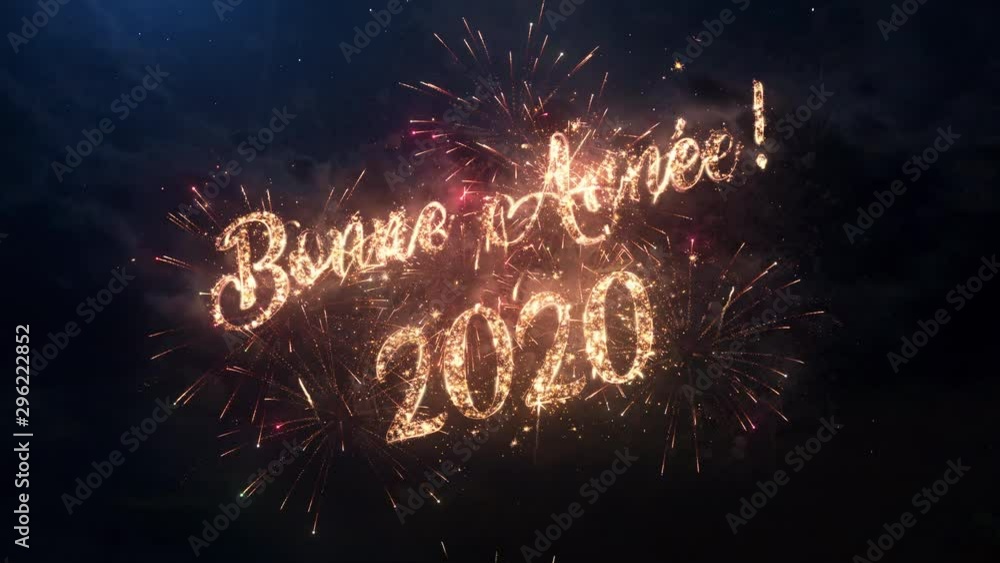 2020 Happy New Year greeting text in French with particles and sparks on black night sky with colored slow motion fireworks on background, beautiful typography magic design.