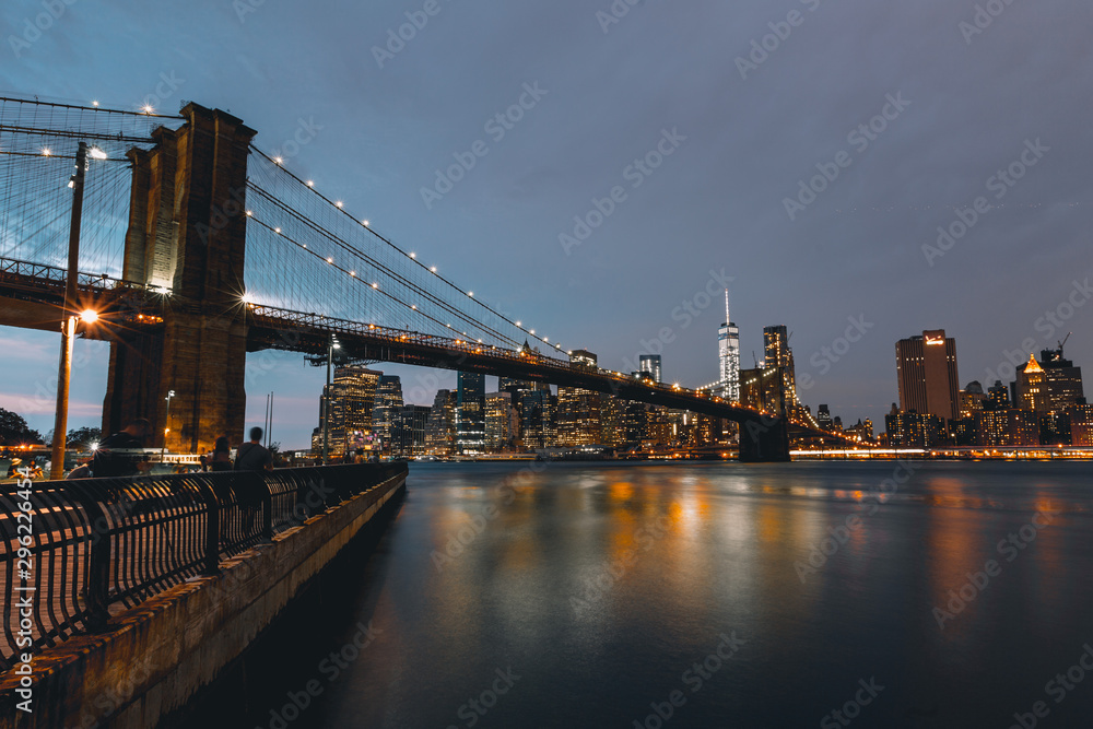 Brooklyn Bridge with New York City Skyline in the Background with One World Trade and Skyline at Night
