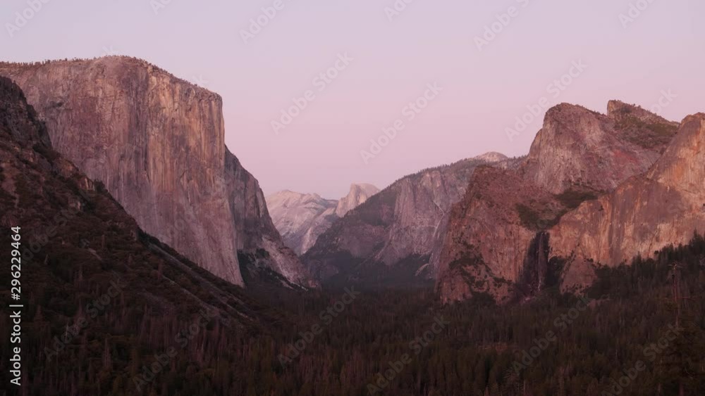 a sunset pan of yosemite valley from tunnel view at yosemite national park in california, usa a sunset pan of yosemite valley from tunnel view at yosemite national park in california, usa
