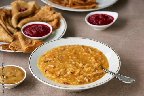 Pea soup and pancakes with lingonberry sauce