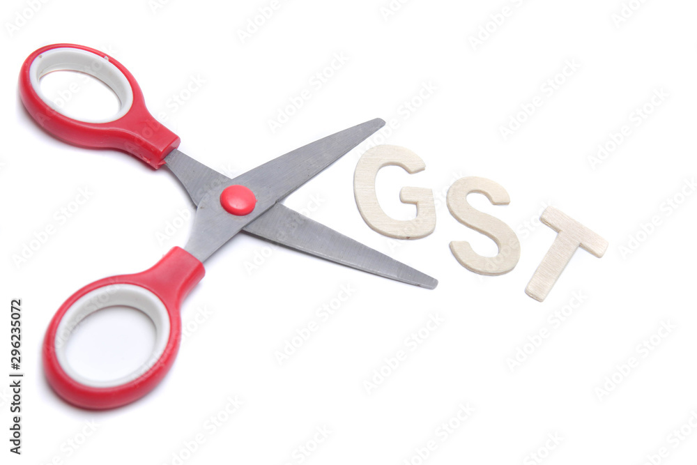 GST word with scissor isolated white background GST word with scissor isolated white background