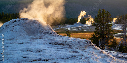 Geysers in Yellowstone National Park at sunset
