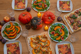 Thanksgiving table , decorated with bright autumn leaves