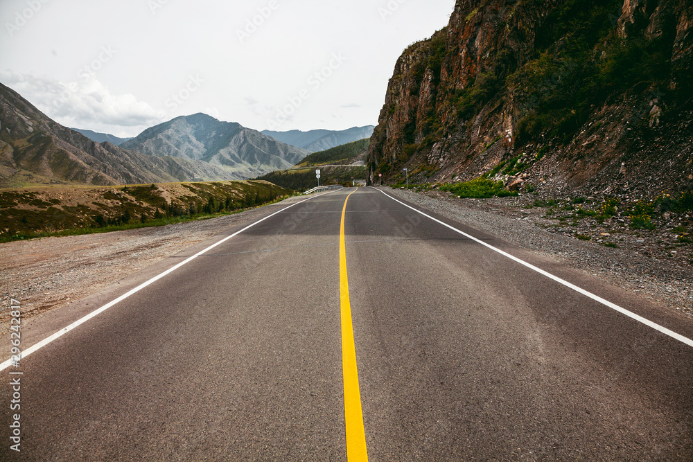 high-speed road between the mountains in Altai