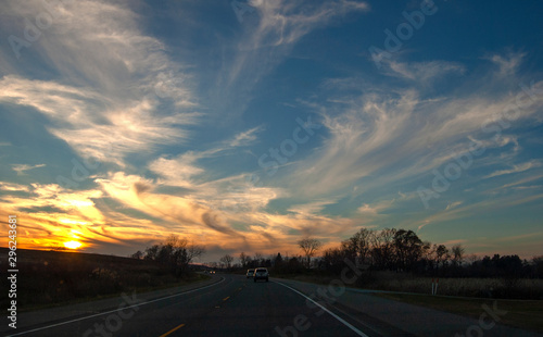 on the road with scattered Clouds in Blue sky at sunset