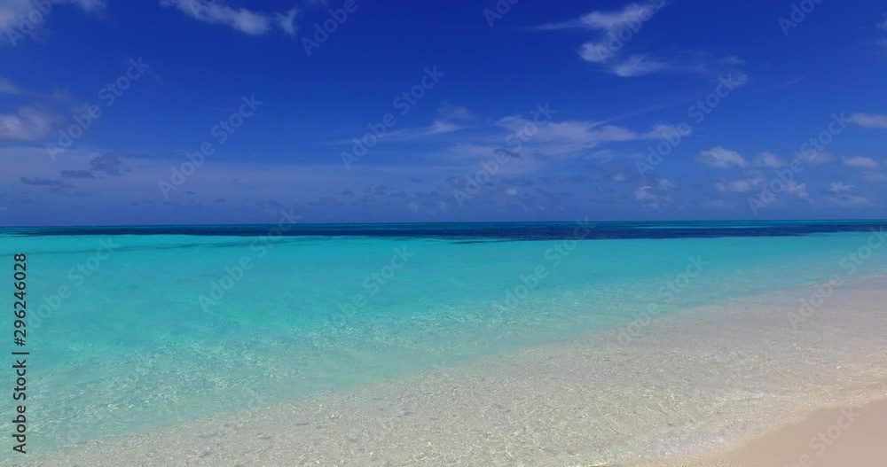 Tropical white sand beach and blue ocean with crystal water in Bali. Tropical white sand beach and blue ocean with crystal water in Bali.