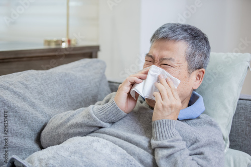 asian elderly sick man sneeze