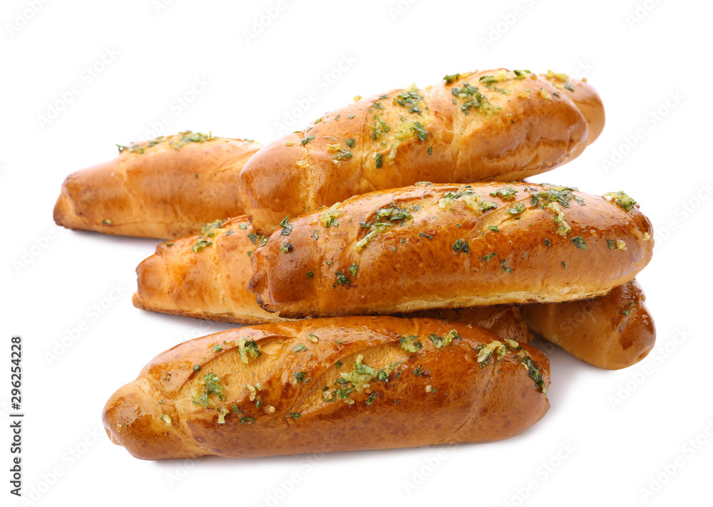 Bread loaves with garlic and herbs on white background