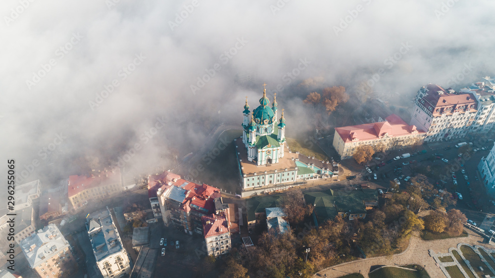 Aerial view of St. Andrew's Church in heavy fog, Kiev, Ukraine