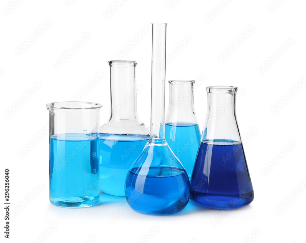 Laboratory glassware with blue liquids isolated on white Laboratory glassware with blue liquids isolated on white