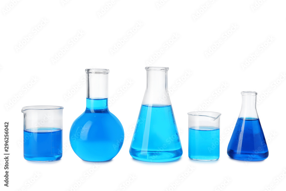 Laboratory glassware with blue liquids isolated on white Laboratory glassware with blue liquids isolated on white