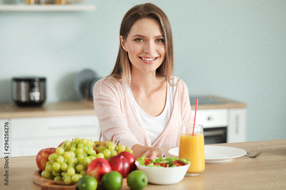 Woman with healthy food in kitchen. Diet concept Woman with healthy food in kitchen. Diet concept