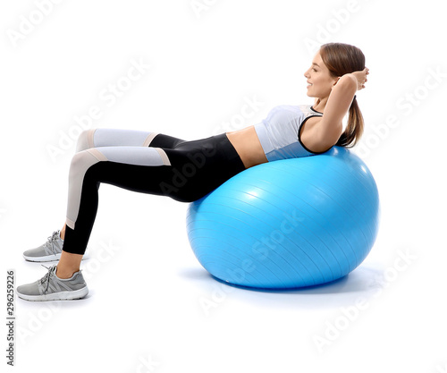 Sporty young woman training...