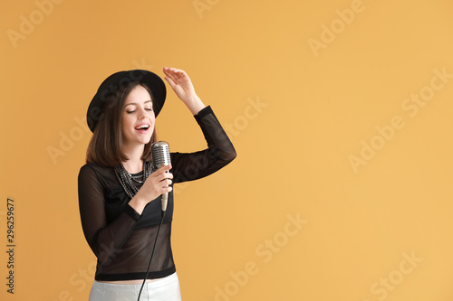 Beautiful young female sing...