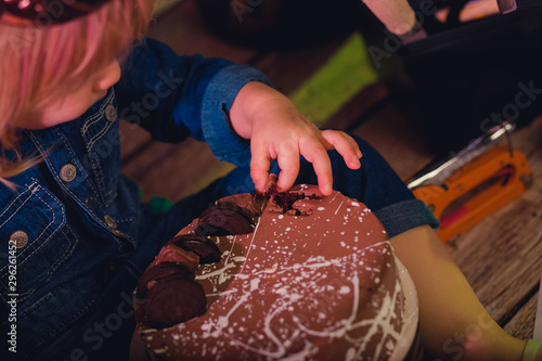 Infant boy's first birthday cake smash Adorable baby smashing cake photo