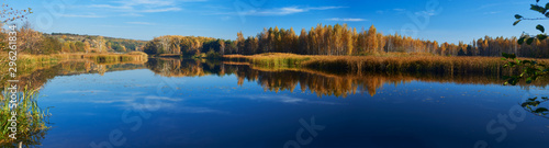 Panorama of autumn forest and river