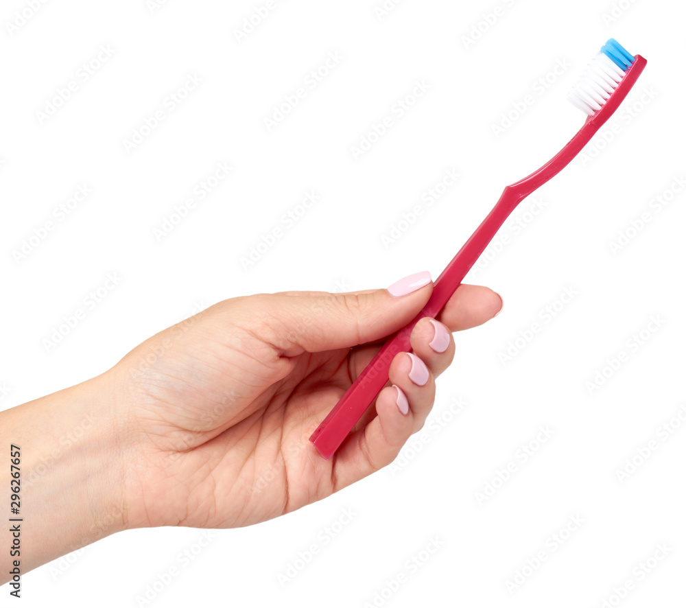 Hand with color toothbrush, dental care and freshness.