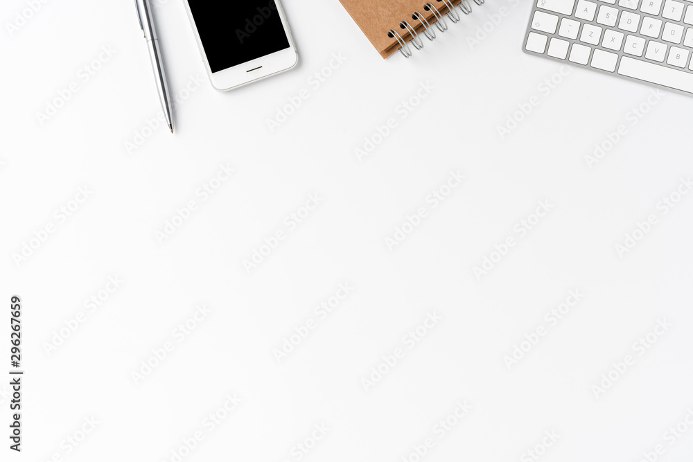 Modern workspace with computer accessories, smartphone and notebook. Office desktop concept Modern workspace with computer accessories, smartphone and notebook. Office desktop concept