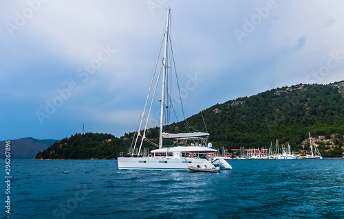 catamaran anchored in a bay
