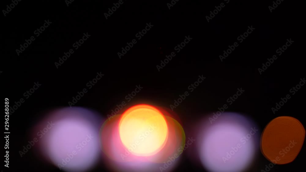 Blurred bokeh traffic on the road at night in a big city. Blurred bokeh traffic on the road at night in a big city.