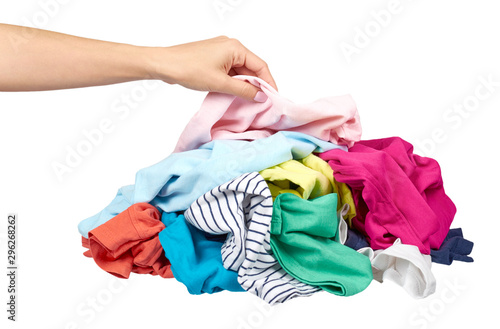 Hand with assorted clothes, loundry housework. Isolated.