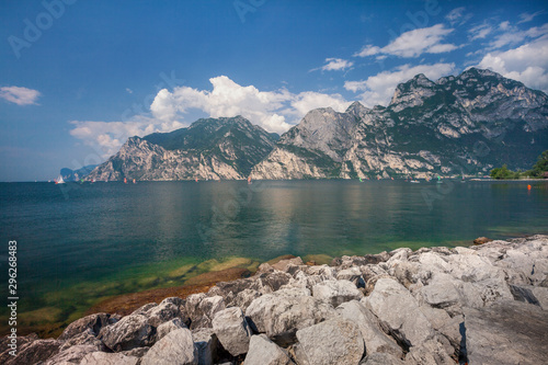 View of Lake Garda and Torbole beach area in summer sunny day