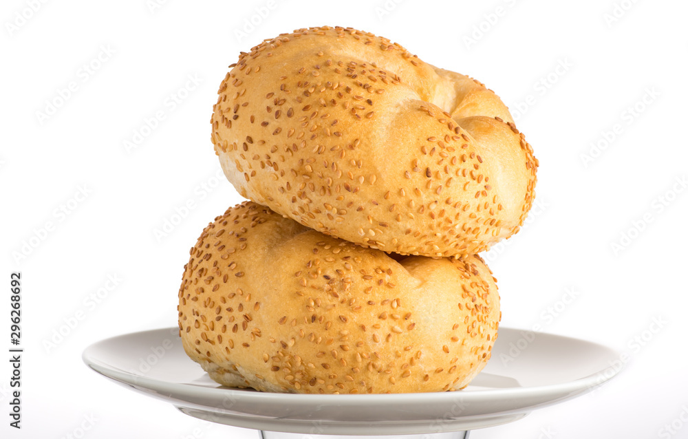 bun baking on a white plate or in a transparent bag on a white background bun baking on a white plate or in a transparent bag on a white background