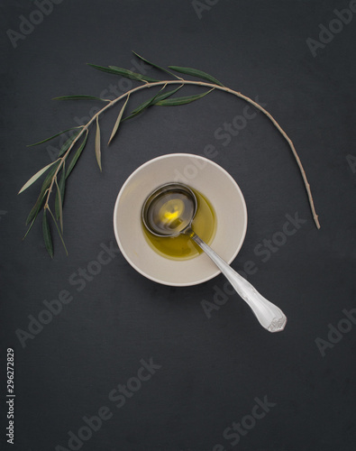 Olive oil premium presentation in a soft dark background