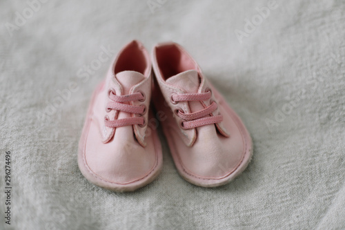 pink baby boots. Baby shoes. top view, copy space