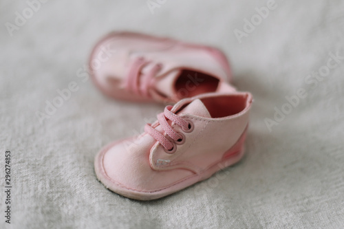 pink baby boots. Baby shoes. top view, copy space