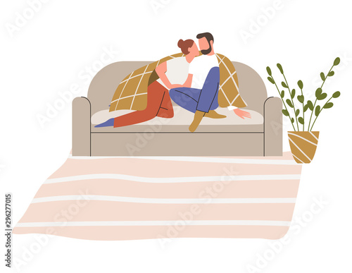 Adorable romantic couple hugging on sofa under the plaid. Man and woman cuddling on sofa. Flat vector illustration