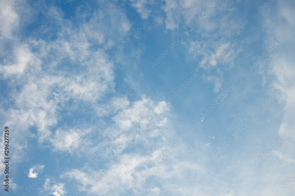 Scattered white clouds on blue sky. Scattered white clouds on blue sky.