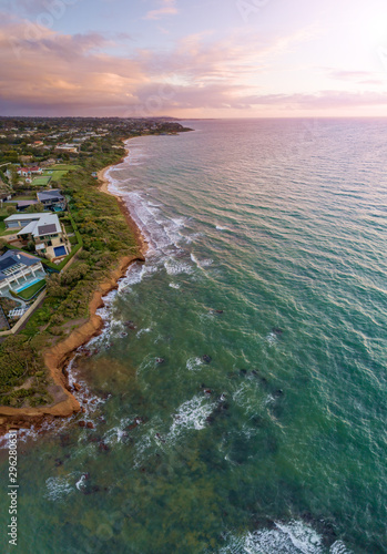 Vertical aerial panorama of Mornington Peninsula coastline in Melbourne, at sunset photo