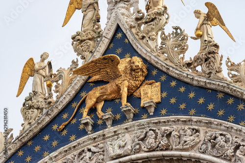 Venice, closeup of the Basilica and Cathedral of San Marco (St. Mark the evangelist), with the golden winged lion. UNESCO world heritage site, Veneto, Italy, Europe