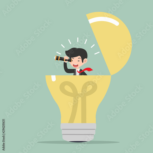 businessman using a telescope with light bulb Idea concept