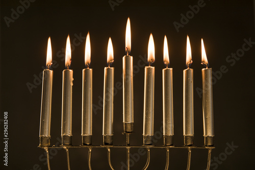 Magnificent menorah with burning candles