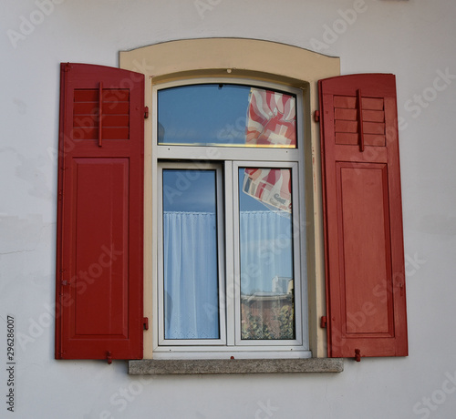 An old window belonging to an old house in Switzerland. Lugano.