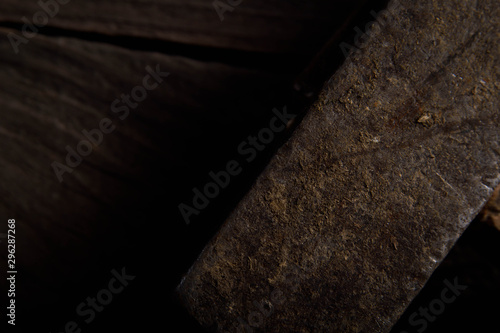 Different workpieces on a wooden background. Hedge wrenches keys, hammer