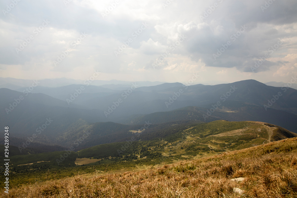 Beautiful landscape of mountains and forests against the blue sky. Travel concept. Beautiful landscape of mountains and forests against the blue sky. Travel concept.