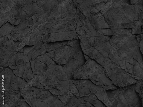 Black rocks texture. Dark stone texture background. Mountain close-up.
