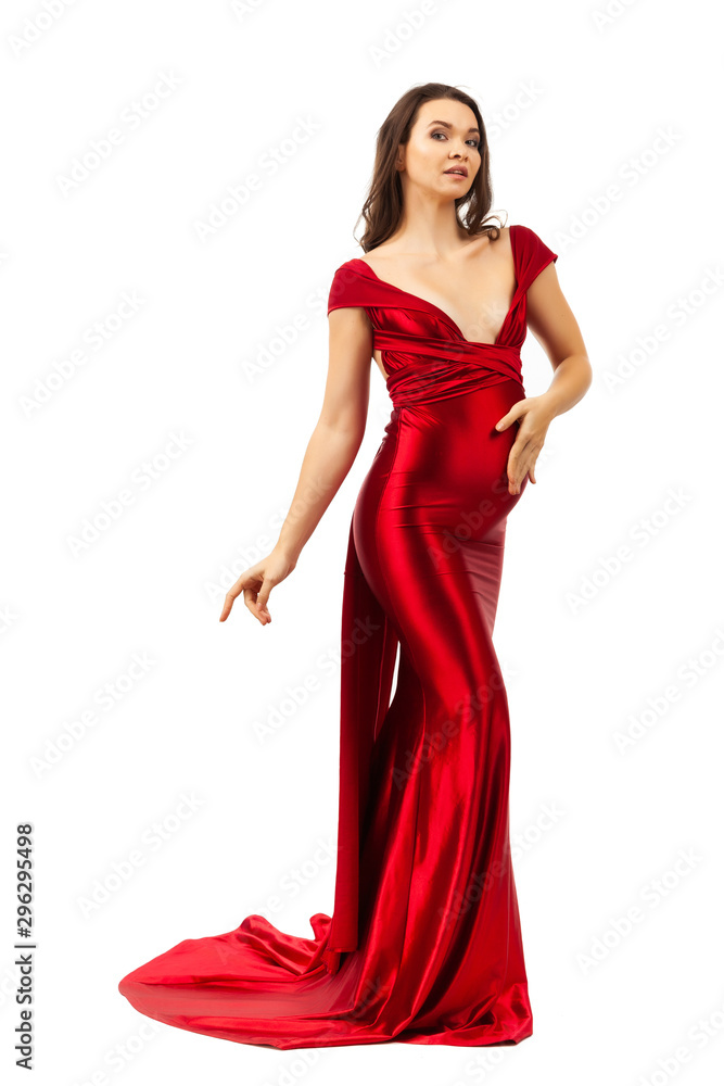 Pregnant woman in a red dress on a white background.