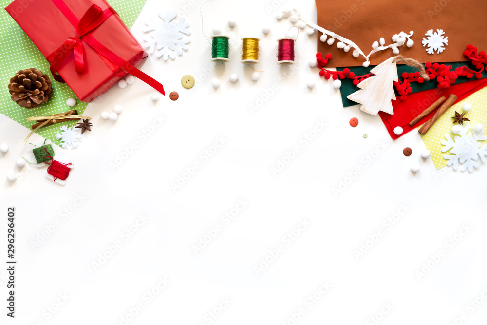 Merry Christmas and New Year holidays banner. Gift wrapping workspace. Decoration presents making flat lay top view Xmas celebration preparation DIY concept decor on white background.