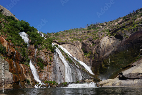 Image of beautiful waterfall among the rocks on Ezaro in Galicia, Spain.