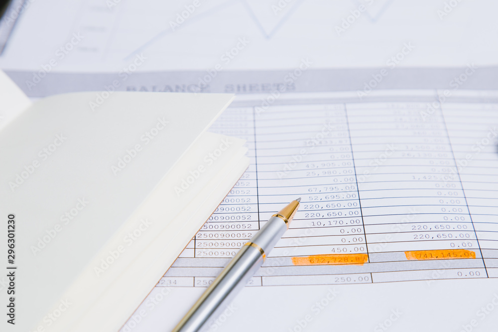 Spreadsheet bank accounts accounting with calculator.Concept for financial fraud investigation, audit and analysis. Spreadsheet bank accounts accounting with calculator.Concept for financial fraud investigation, audit and analysis.