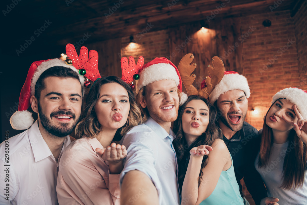 Fototapeta premium Self-portrait of nice attractive beautiful handsome lovely cheerful comic glad flirty coquettish positive ladies gentlemen having fun showing v-sign costume in industrial loft interior room