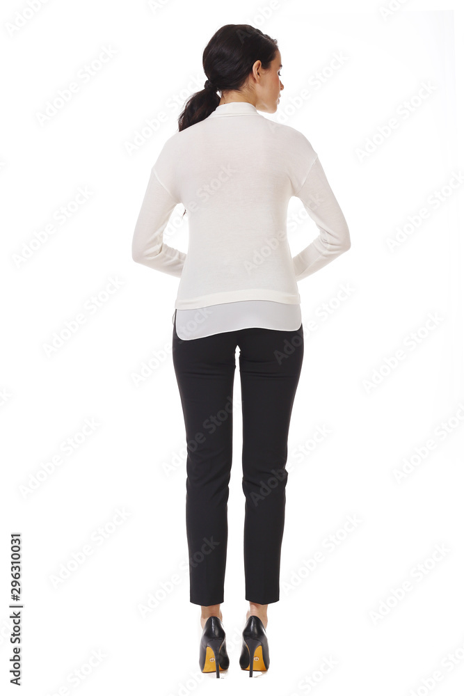 young caucasian business woman executive posing in white formal blouse and black trousers high heels stiletto shoes full body length young caucasian business woman executive posing in white formal blouse and black trousers high heels stiletto shoes full body length