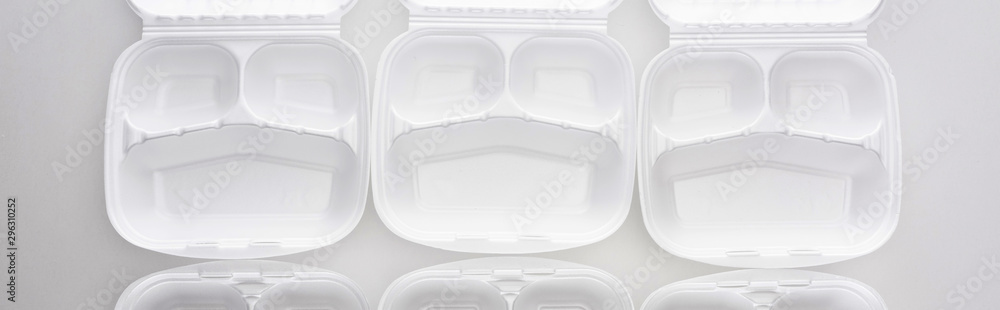 panoramic shot of empty eco packages on white background panoramic shot of empty eco packages on white background