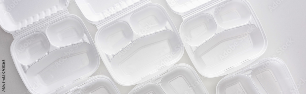 panoramic shot of empty eco packages on white background panoramic shot of empty eco packages on white background