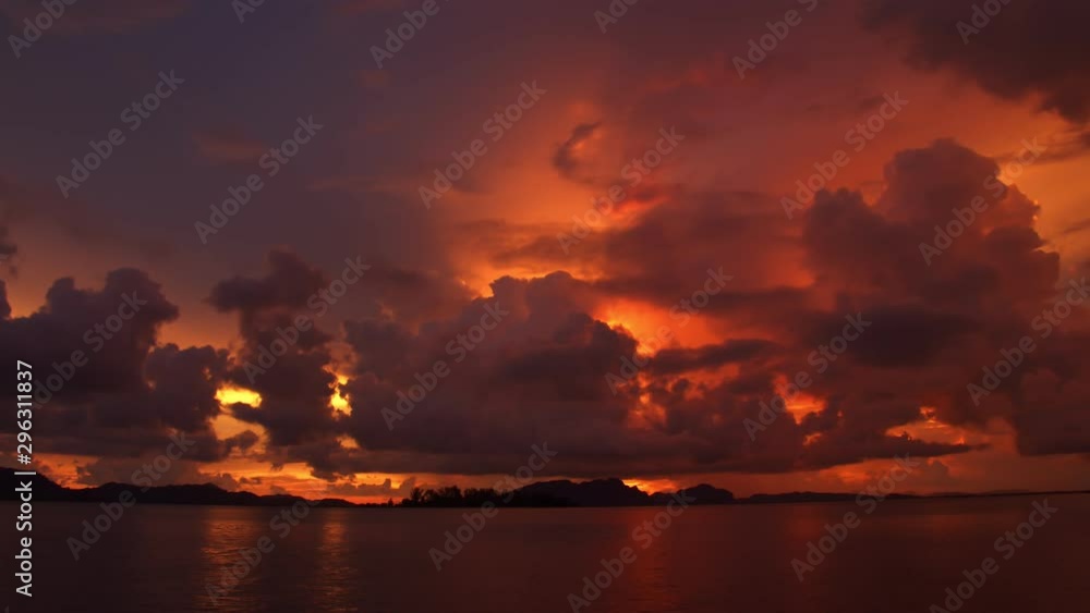 4k time lapse - Colorful of clouds and sky at sunset. Dramatic sky. Landscape view of sea in twilight. atmosphere tropical 4k time lapse - Colorful of clouds and sky at sunset. Dramatic sky. Landscape view of sea in twilight. atmosphere tropical