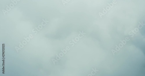 Aerial drone view flying over a cloudscape mid day with blue skies, travel airlines freedom concept photo